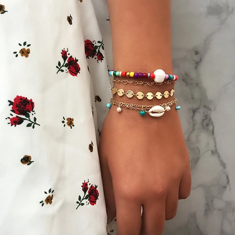 Three PCs Bracelet with Gold, Pearls, and Seashell A010